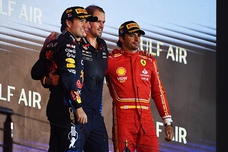 Max Verstappen, Sergio Perez, and Carlos Sainz on the podium at the Bahrain GP, March 2, 2024.