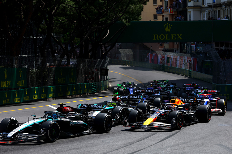 George Russell leads Max Verstappen at the start of the Monaco GP at Circuit de Monaco, May 26, 2024.