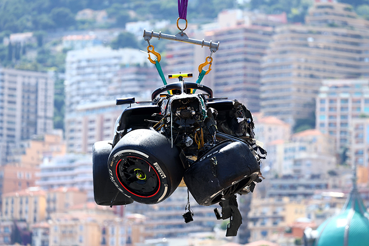 The car of Sergio Perez is recovered from the track after his crash during the Monaco GP at Circuit de Monaco, May 26, 2024.