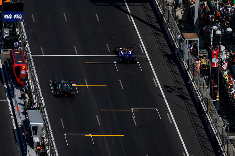 Yuki Tsunoda and Lewis Hamilton practice starts during practice ahead of the Azerbaijan GP at Baku City Circuit, September 13, 2024.