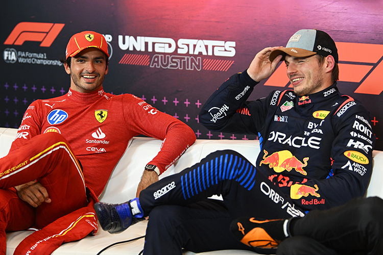 Max Verstappen talks with Carlos Sainz in the press conference after winning the Sprint at Circuit of The Americas, October 19, 2024.