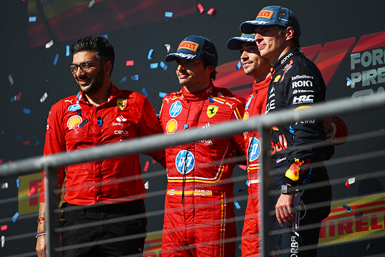 Charles Leclerc, Carlos Sainz, and Max Verstappen pose on the podium after the United States GP at Circuit of The Americas, October 20, 2024.