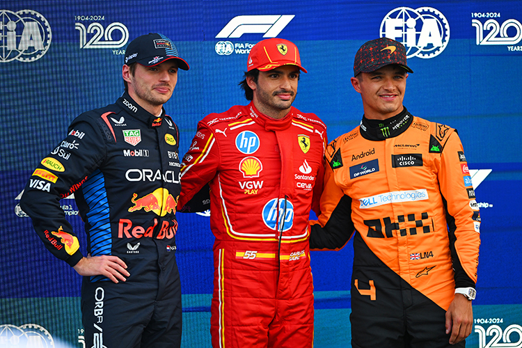 Carlos Sainz, Max Verstappen, and Lando Norris pose in parc ferme after qualifying for the Mexico GP at Autodromo Hermanos Rodriguez, October 26, 2024.