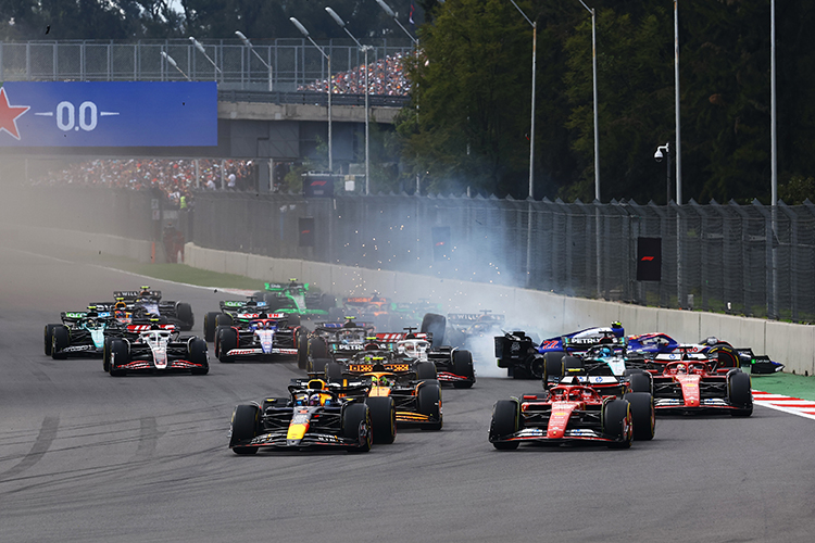 Max Verstappen leads Carlos Sainz and Lando Norris into turn 1 at the start of the Mexico GP at Autodromo Hermanos Rodriguez, October 27, 2024.