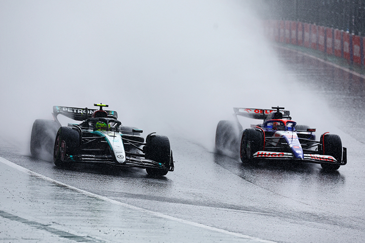 Lewis Hamilton leads Liam Lawson on track during the Brazilian GP at Autodromo Jose Carlos Pace, November 3, 2024.