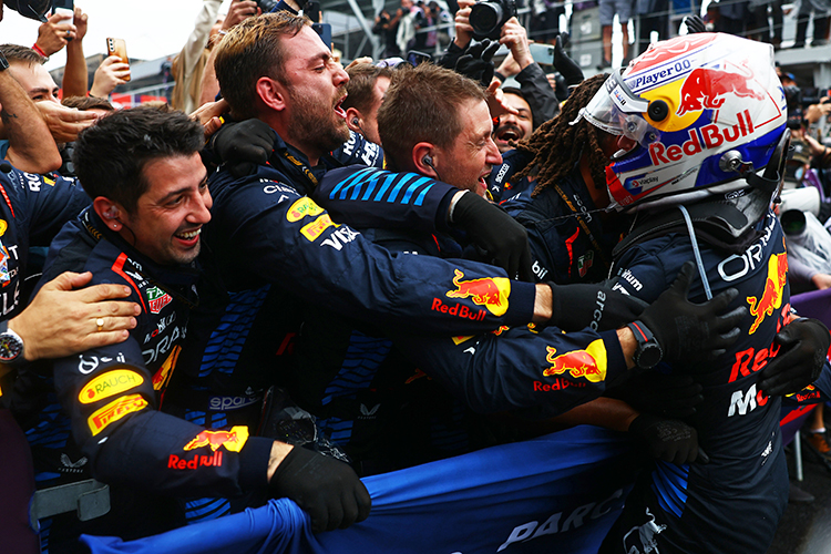 Max Verstappen celebrates with his team in parc ferme after winning the Brazilian GP at Autodromo Jose Carlos Pace, November 3, 2024.