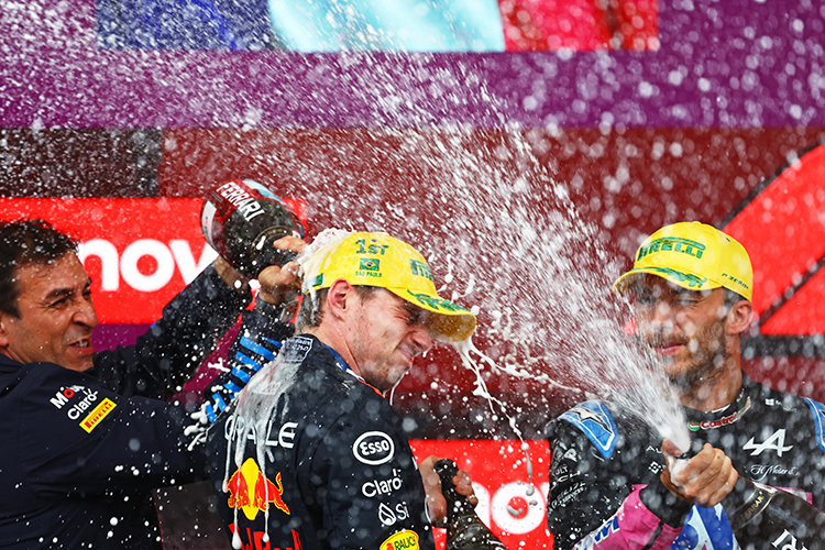 Max Verstappen and Pierre Gasly celebrate on the podium after the Brazilian GP at Autodromo Jose Carlos Pace, November 3, 2024.