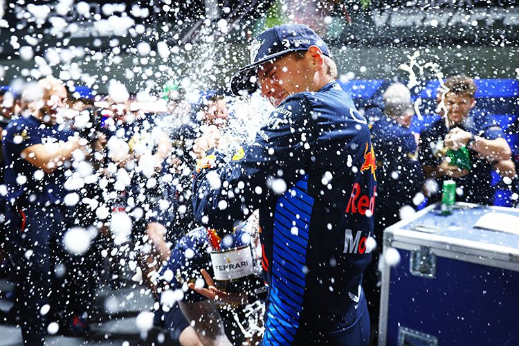 2024 F1 World Drivers Champion Max Verstappen of the Netherlands and Oracle Red Bull Racing celebrates with his team after the F1 Grand Prix of Las Vegas at Las Vegas Strip Circuit on November 23, 2024.