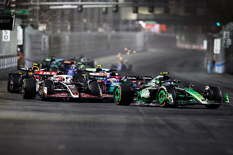 Zhou Guanyu of China driving the (24) Kick Sauber C44 Ferrari leads Kevin Magnussen of Denmark driving the (20) Haas F1 VF-24 Ferrari and Liam Lawson of New Zealand driving the (30) Visa Cash App RB VCARB 01 on track during the F1 Grand Prix of Las Vegas at Las Vegas Strip Circuit on November 23, 2024.