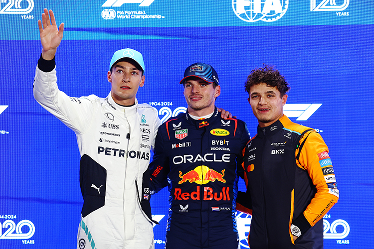 Max Verstappen, George Russell, and Lando Norris pose in parc ferme after qualifying for the 2024 F1 Grand Prix of Qatar at Lusail International Circuit on November 30, 2024.