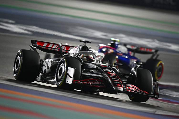 Kevin Magnussen of Denmark leads Yuki Tsunoda of Japan on track during the 2024 F1 Grand Prix of Qatar at Lusail International Circuit on December 01, 2024.